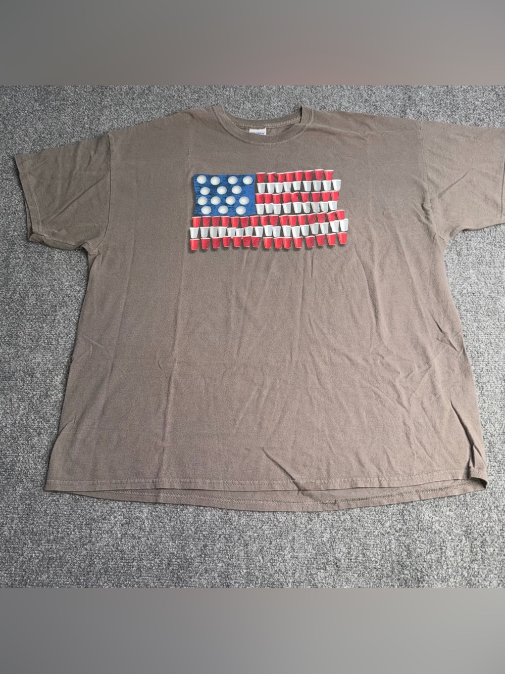 Men's Brown Graphic Tee with Red, White & Blue Flag Design